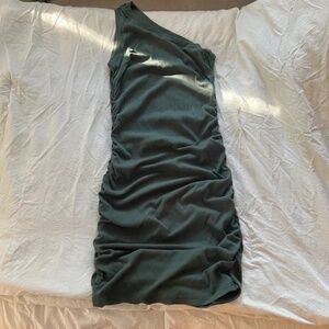green one shoulder body con mini dresses with touching on sides